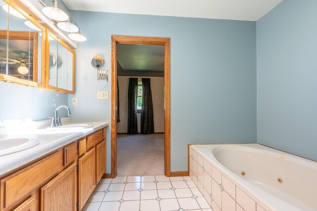 W5670 School Rd, Walworth, WI 53184 - full bath featuring a tub with jets, double vanity, and ceiling fan