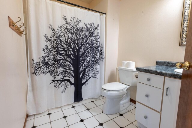 W5670 School Rd, Walworth, WI 53184 - full bath with vanity, toilet, and a shower with shower curtain