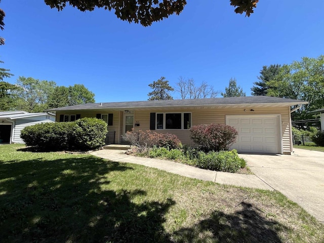 425 Mineau Pkwy, Madison, WI 53711 - ranch-style home featuring an attached garage, driveway, and a front lawn