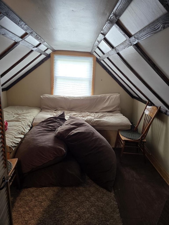 Pine Ln, Bloomington, WI 53804 - bedroom with vaulted ceiling, carpet floors, and baseboards