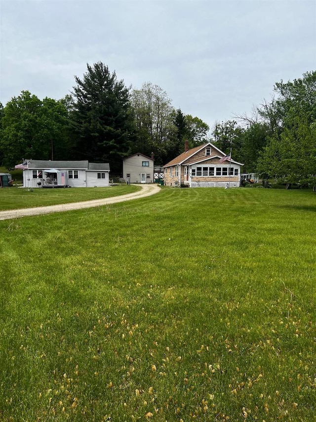 756 W Happy Hollow Rd, Janesville, WI 53546 - view of front facade with a front yard