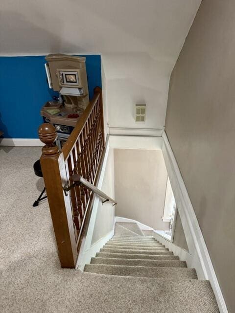 219 E 9th St, Fond Du Lac, WI 54935 - stairs with carpet floors and baseboards