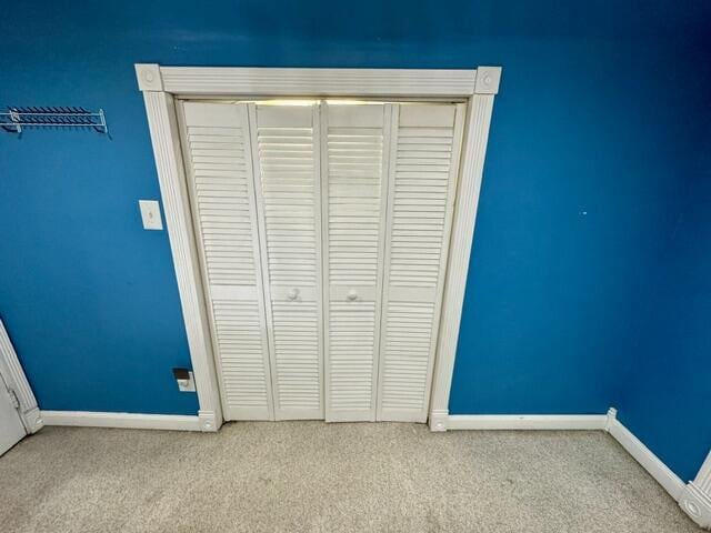 219 E 9th St, Fond Du Lac, WI 54935 - unfurnished bedroom with carpet flooring, baseboards, and a closet