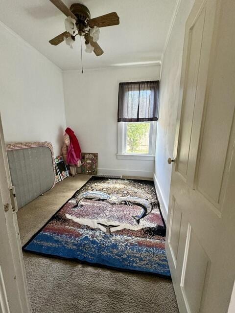 219 E 9th St, Fond Du Lac, WI 54935 - bedroom with carpet floors, a ceiling fan, and baseboards