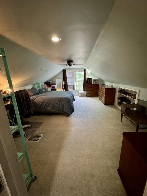 219 E 9th St, Fond Du Lac, WI 54935 - bedroom featuring carpet flooring, lofted ceiling, and ceiling fan