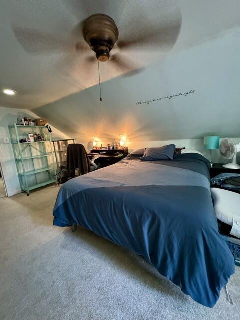 219 E 9th St, Fond Du Lac, WI 54935 - bedroom with carpet, vaulted ceiling, and ceiling fan