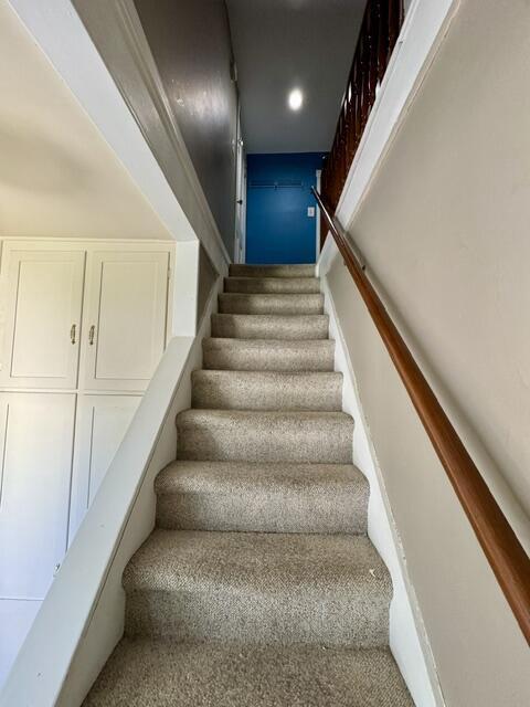 219 E 9th St, Fond Du Lac, WI 54935 - staircase with carpet