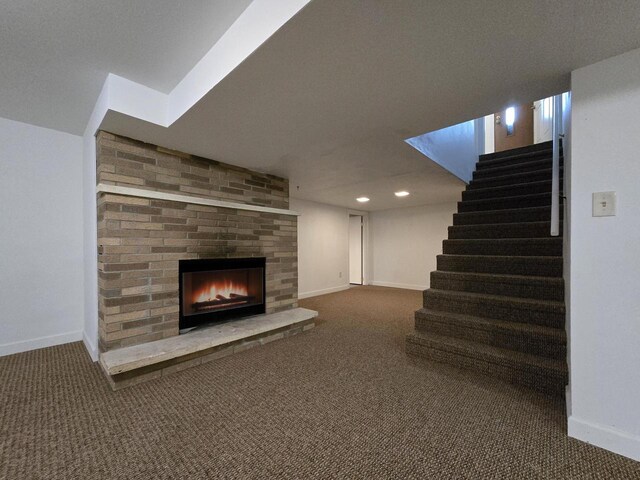4211 State Highway 173, Nekoosa, WI 54457 - unfurnished living room with carpet flooring, baseboards, stairway, and recessed lighting