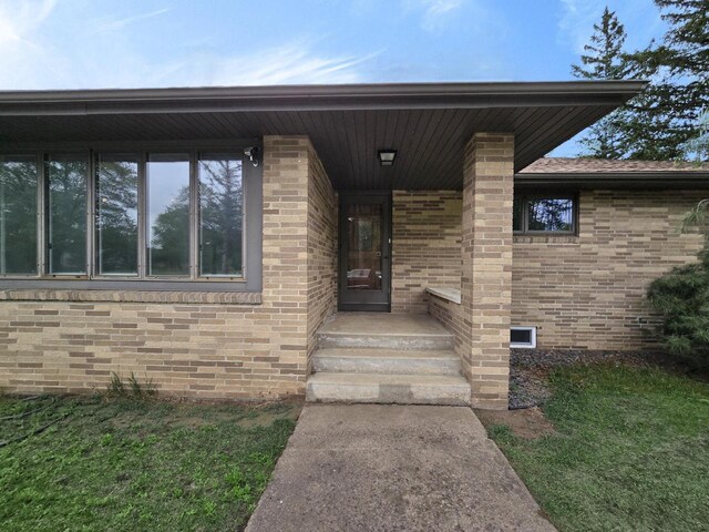 4211 State Highway 173, Nekoosa, WI 54457 - view of exterior entry featuring brick siding