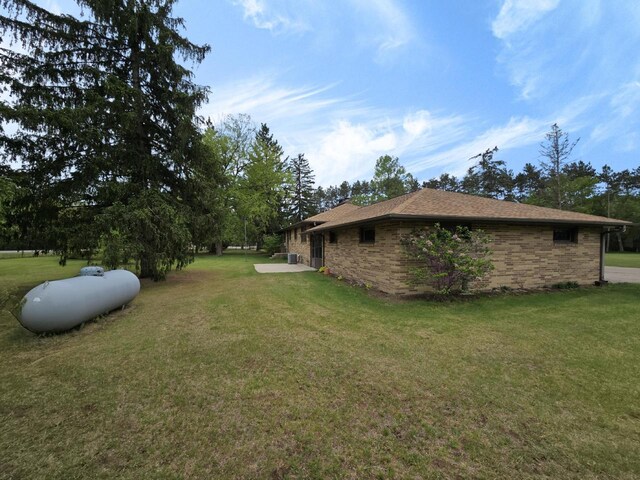 4211 State Highway 173, Nekoosa, WI 54457 - view of grassy yard featuring a patio
