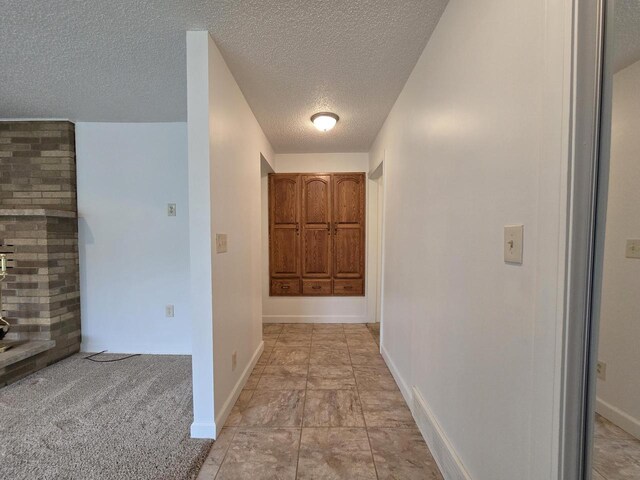 4211 State Highway 173, Nekoosa, WI 54457 - corridor featuring a textured ceiling and baseboards