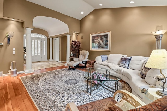 W11078 S Shore Rd, Deerbrook, WI 54425 - living area featuring decorative columns, baseboards, wood finished floors, recessed lighting, and high vaulted ceiling