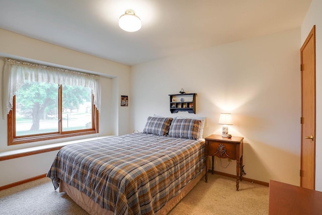 741 Kensington Sq, Stoughton, WI 53589 - bedroom with light colored carpet and baseboards