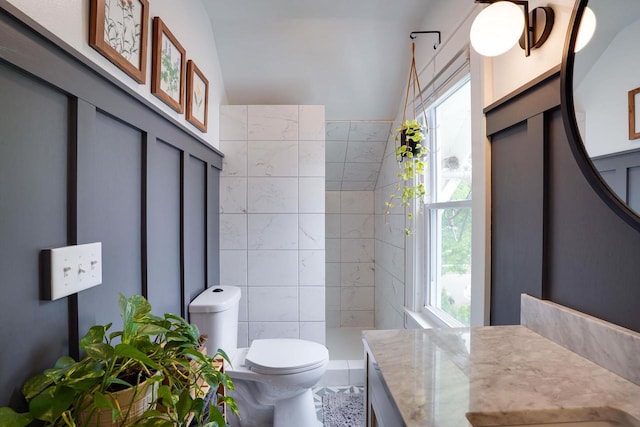 350 Washington St, Prairie Du Sac, WI 53578 - full bathroom featuring toilet, vanity, and tiled shower