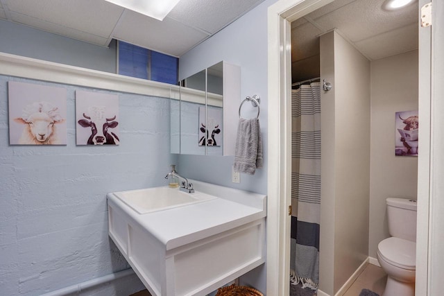 350 Washington St, Prairie Du Sac, WI 53578 - full bath with toilet, vanity, baseboards, and curtained shower