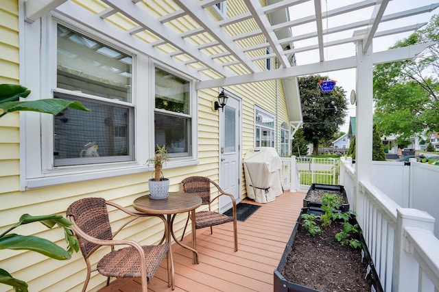 350 Washington St, Prairie Du Sac, WI 53578 - deck with grilling area and a pergola