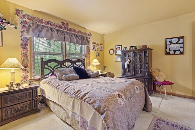 W156N8813 Pilgrim Rd, Menomonee Falls, WI 53051 - carpeted bedroom featuring baseboards