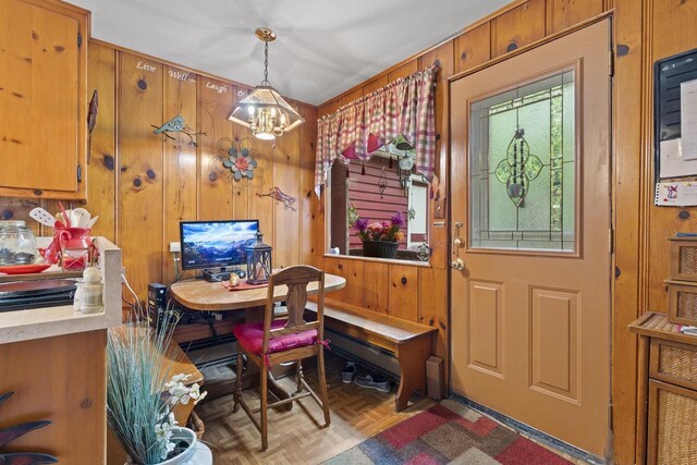 W156N8813 Pilgrim Rd, Menomonee Falls, WI 53051 - dining area with wood walls and a desk