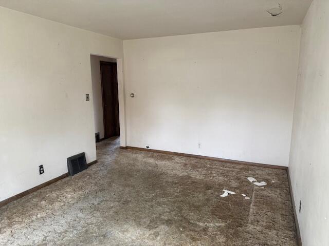 424 S 66th St, Milwaukee, WI 53214 - empty room with carpet floors