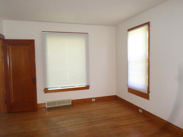 1909 91st St, Pleasant Prairie, WI 53158 - spare room featuring baseboards and wood finished floors