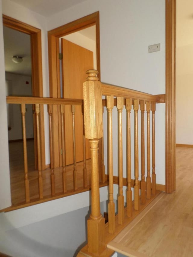 1909 91st St, Pleasant Prairie, WI 53158 - stairs with wood finished floors and baseboards