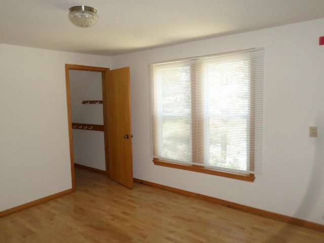 1909 91st St, Pleasant Prairie, WI 53158 - empty room with baseboards and light wood finished floors