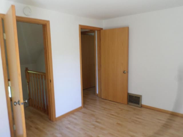 1909 91st St, Pleasant Prairie, WI 53158 - spare room with light wood finished floors and baseboards
