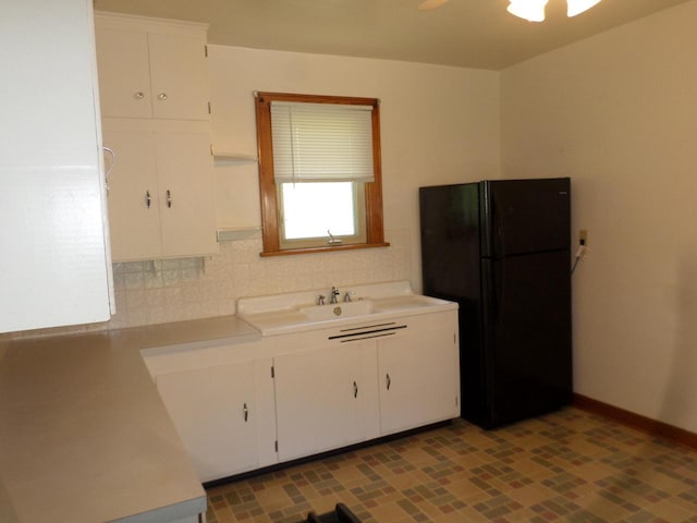 1909 91st St, Pleasant Prairie, WI 53158 - kitchen featuring freestanding refrigerator, white cabinets, light countertops, a ceiling fan, and baseboards