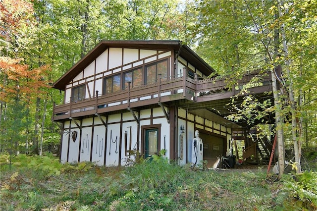 16680W Raining Tree Rd, Stone Lake, WI 54876 - back of house with a deck