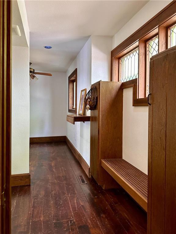 16680W Raining Tree Rd, Stone Lake, WI 54876 - entryway featuring hardwood / wood-style flooring, a ceiling fan, and baseboards