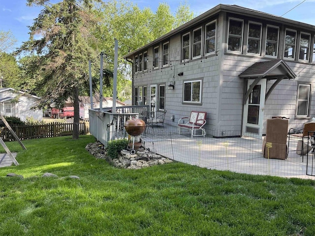4512 Larson St, Mcfarland, WI 53558 - back of property featuring a patio area