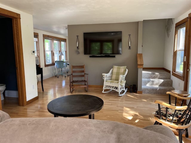 4512 Larson St, Mcfarland, WI 53558 - living room featuring wood finished floors and baseboards
