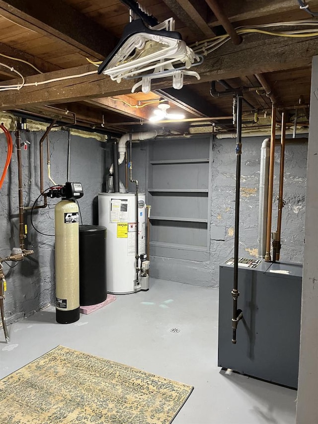 4512 Larson St, Mcfarland, WI 53558 - unfinished basement featuring gas water heater and a water softener