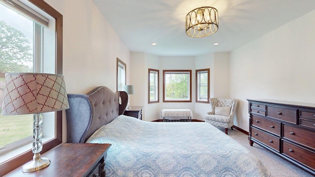 W10559 Hickory Point Rd, Beaver Dam, WI 53916 - bedroom featuring light colored carpet, a chandelier, baseboards, and recessed lighting