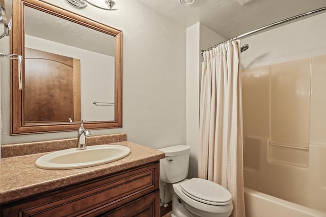 6383 Northwestern Dr, Rhinelander, WI 54501 - bathroom featuring vanity, toilet, and shower / bath combo with shower curtain
