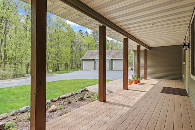 6383 Northwestern Dr, Rhinelander, WI 54501 - wooden deck with an outdoor structure and a yard