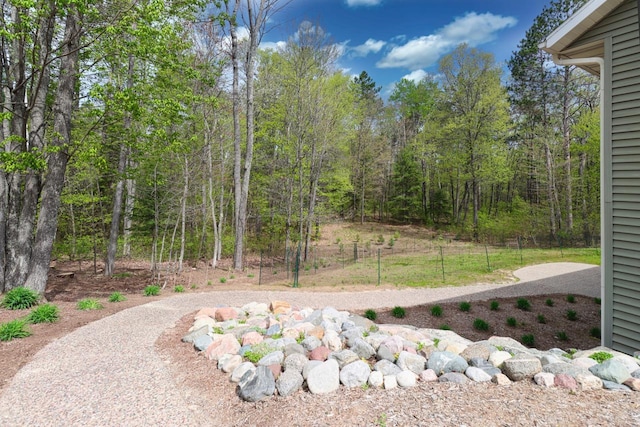 6383 Northwestern Dr, Rhinelander, WI 54501 - view of yard featuring a wooded view