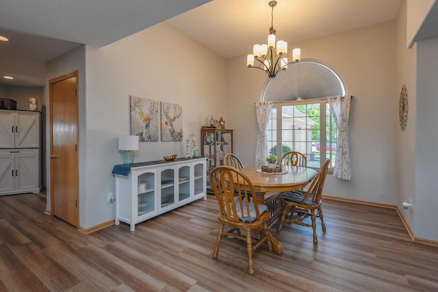 217 Steeple Ct, Johnson Creek, WI 53038 - dining room featuring a chandelier, wood finished floors, baseboards, and recessed lighting