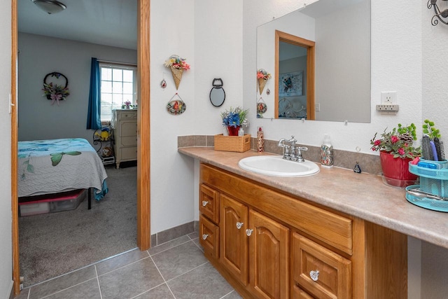 217 Steeple Ct, Johnson Creek, WI 53038 - bathroom featuring vanity, connected bathroom, and tile patterned floors