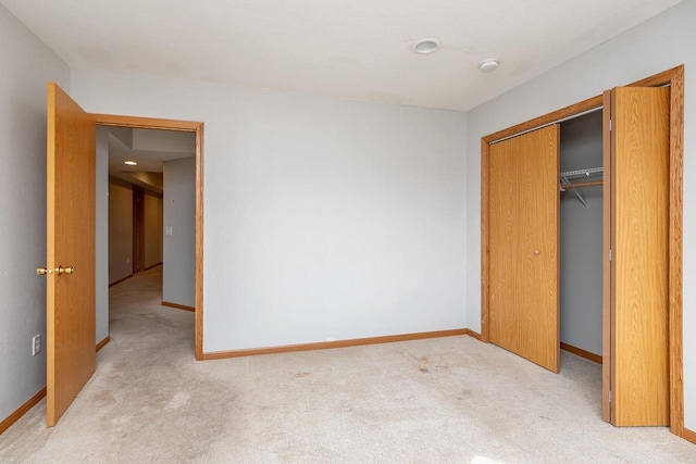 217 Steeple Ct, Johnson Creek, WI 53038 - unfurnished bedroom featuring light colored carpet, baseboards, and a closet
