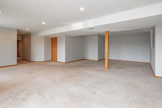 217 Steeple Ct, Johnson Creek, WI 53038 - finished below grade area with light colored carpet, baseboards, and recessed lighting