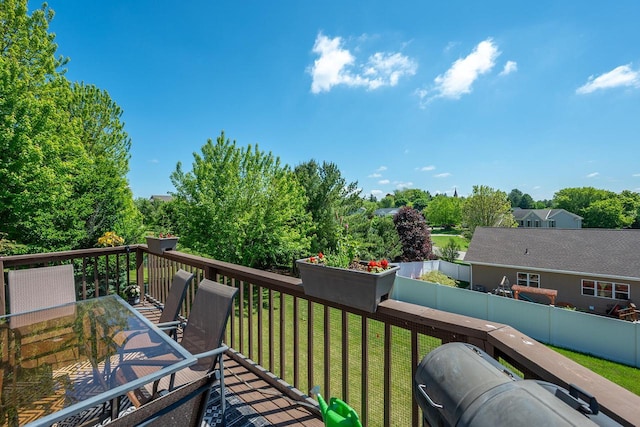 217 Steeple Ct, Johnson Creek, WI 53038 - wooden deck featuring outdoor dining space and view of wooded area