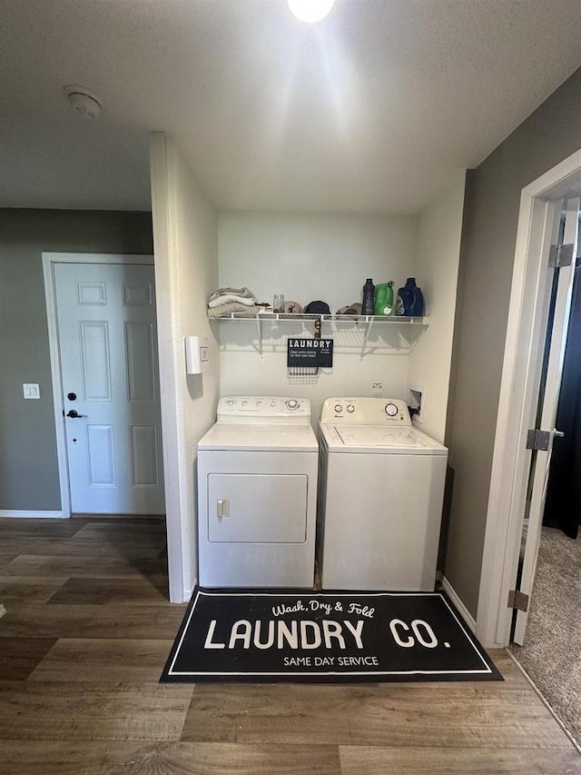 916 S Madison St Unit 9, Waupun, WI 53963 - laundry area with independent washer and dryer, wood finished floors, and baseboards