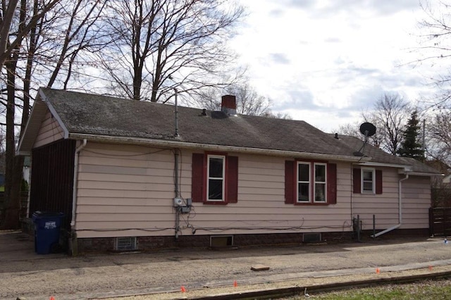 1305 La Crescent St, La Crosse, WI 54603 - view of home's exterior featuring a chimney