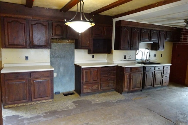 1305 La Crescent St, La Crosse, WI 54603 - kitchen featuring beam ceiling, a sink, dark brown cabinets, decorative light fixtures, and a ceiling fan