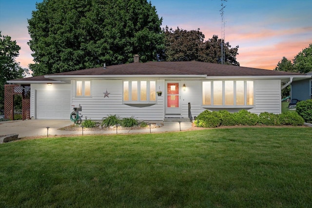 15 Wilson Ave, Fort Atkinson, WI 53538 - ranch-style home featuring a garage, a front yard, and driveway