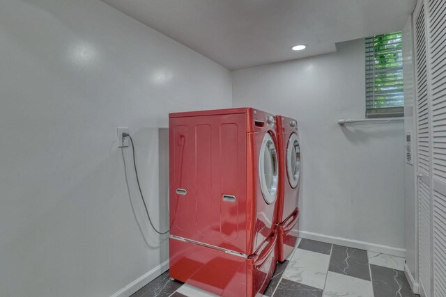 13460 Tremont St, Brookfield, WI 53005 - laundry area with washing machine and clothes dryer, baseboards, marble finish flooring, and recessed lighting