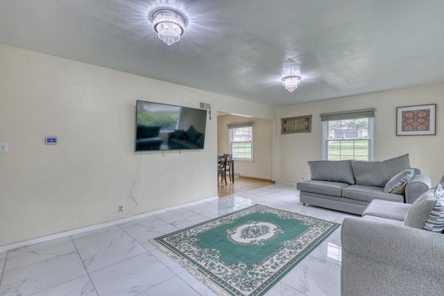 13460 Tremont St, Brookfield, WI 53005 - living room with marble finish flooring and baseboards