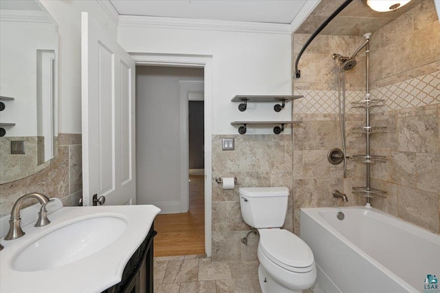 2127 Tower Ave, Superior, WI 54880 - bathroom with tile walls, bathing tub / shower combination, crown molding, toilet, and vanity