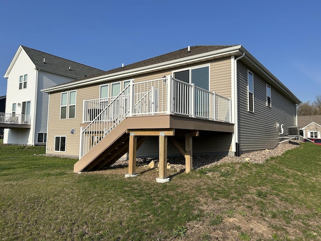 704 River Ridge Drive, Waterford, WI 53185 - rear view of house featuring a yard, cooling unit, a wooden deck, and stairway